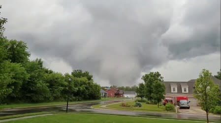 A tornado funnel is seen hovering over an area in South Bend, Indiana