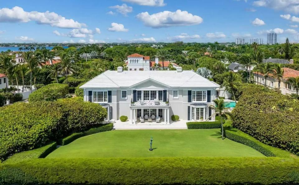 The two-story residence at 101 Jungle Road in Palm Beach has neo-classical architecture with Georgian and Bermuda influences. The oceanfront estate entered the market in September 2022 at $62.9 million.