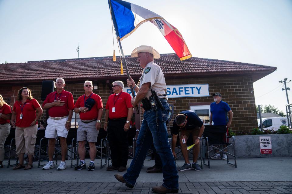 The Iowa flag is presented during the Iowa State Fair opening ceremonies, on Thursday, Aug. 10, 2023, in Des Moines.