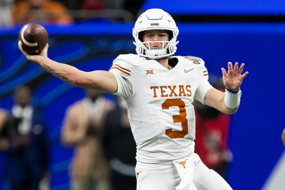 NEW ORLEANS, LA - JANUARY 01: Texas quarterback Quinn Ewers (3) passes the ball during the Allstate Sugar Bowl playoff game between the Texas Longhorns and the Washington Huskies on Monday, January 1, 2024 at Caesars Superdome in New Orleans, LA.  (Photo by Nick Tre. Smith/Icon Sportswire via Getty Images)