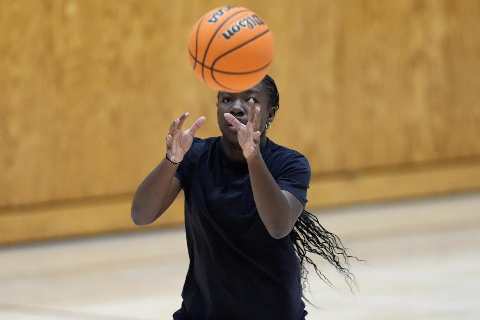 Shay Ijiwoye, who played basketball at Desert Vista High in Phoenix and has committed to Stanford University, works out Monday, March 18, 2024, in Chandler, Ariz. Iowa’s Caitlin Clark has reshaped women's college basketball and the perception of it. Up-and-coming players have taken notice, working to extend their range to be like her. (AP Photo/Matt York)