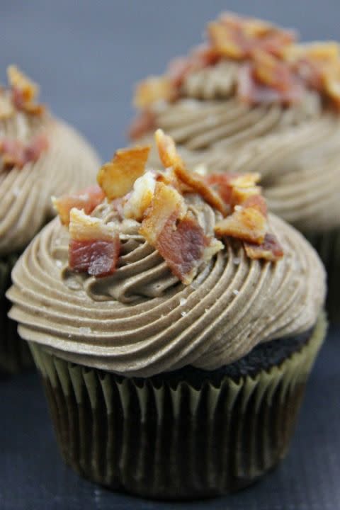 <p>The perfect bite of salty and sweet will have you coming back to these cupcakes again and again.</p><p><strong><a href="http://familyfoodandtravel.com/2015/06/chocolate-covered-bacon-cupcakes.html" rel="nofollow noopener" target="_blank" data-ylk="slk:Get the recipe at Family, Food and Travel.;elm:context_link;itc:0;sec:content-canvas" class="link ">Get the recipe at Family, Food and Travel.</a></strong></p>