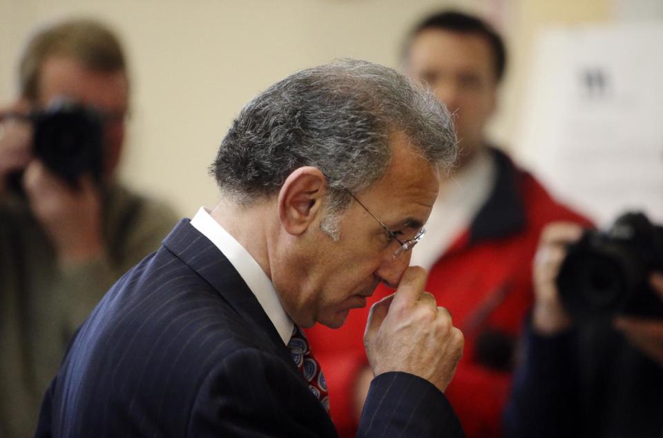 Steve Meshbesher, Byron Smith's attorney, re-enters court following jury deliberation at the Morrison County Courthouse in Little Falls, Minn., Tuesday, April 29, 2014. Smith, who killed two teenagers during a 2012 Thanksgiving Day break-in, was convicted of premeditated murder. The jury took only about three hours to reject his claim of self-defense. He was immediately sentenced to life without parole. (AP Photo/The Star Tribune, David Joles) MANDATORY CREDIT; ST. PAUL PIONEER PRESS OUT; MAGS OUT; TWIN CITIES TV OUT.