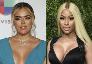 En esta combinación de fotos, la ganadora del Latin Grammy al mejor artista nuevo Karol G, a la izquierda, en la sala de prensa el 15 de noviembre de 2018 en Las Vegas, y Nicki Minaj en el evento benéfico CFDA Vogue Fashion Fund Gala en Nueva York el 6 de noviembre del 2017. Karol G recibió el martes cuatro nominaciones al Latin Grammy, incluyendo dos con Minaj por su éxito "Tusa". La ceremonia de los Latin Grammy se transmitirá en vivo el 19 de noviembre por Univision. (AP Foto)