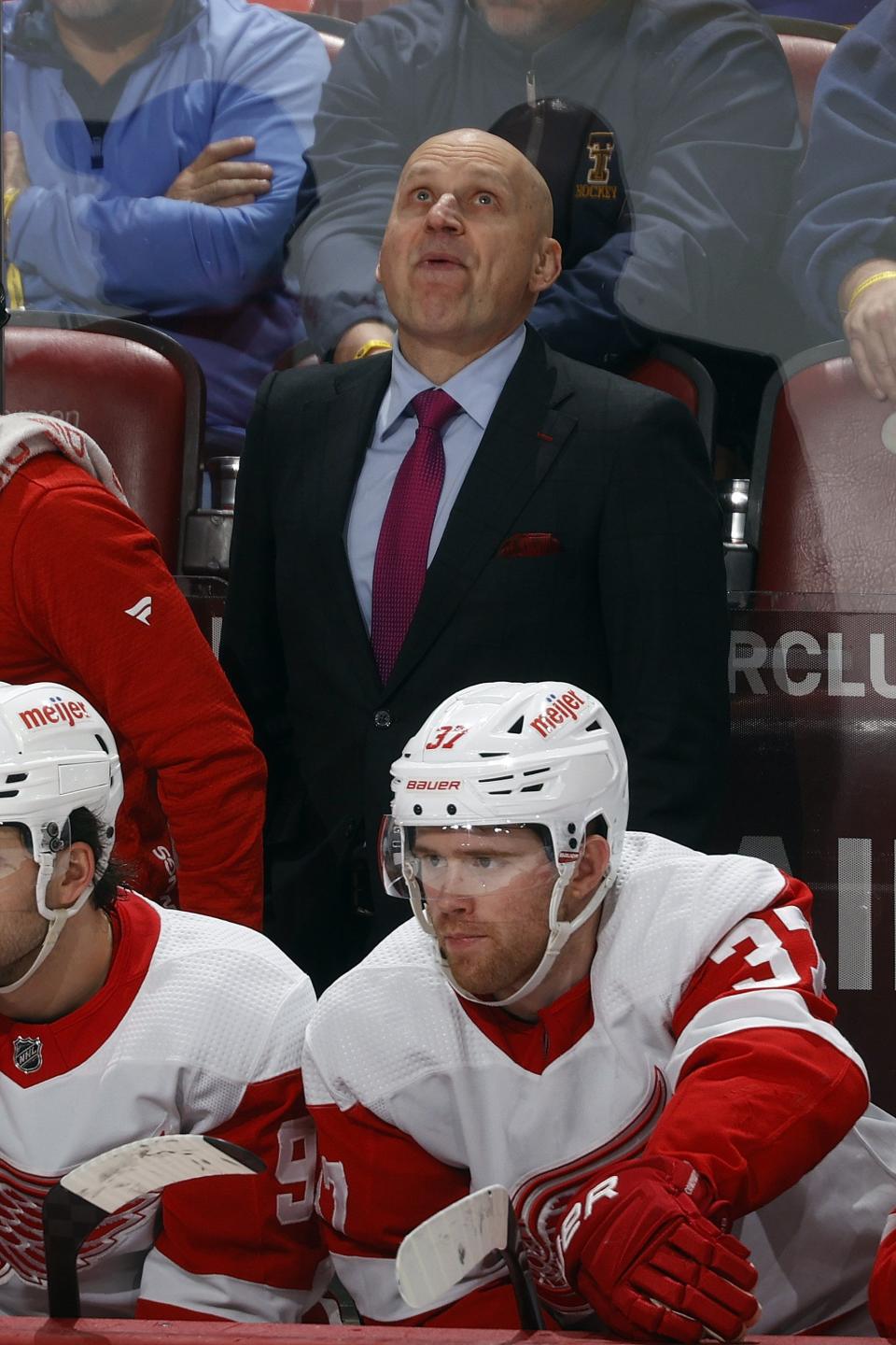 1933430022.jpg SUNRISE, FL - JANUARY 17: Head coach Derek Lalonde of the Detroit Red Wings watches a replay during second period action against the Florida Panthers at the Amerant Bank Arena on January 17, 2024 in Sunrise, Florida. (Photo by Joel Auerbach/Getty Images)