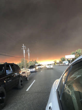 Vehicles are seen during evacuation from Paradise to Chico, in Butte County, California, U.S. in this November 8, 2018 picture obtained from social media. @dlmadethecut/via REUTERS
