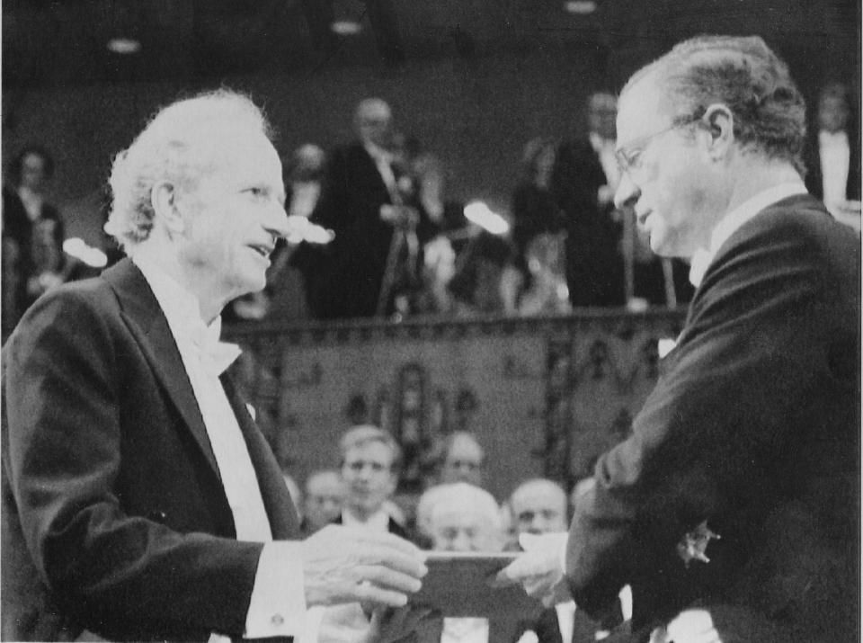 File-This Dec. 10 1992, file photo shows Gary S. Becker, left, from the University of Chicago, Ill., receiving the 1992 Nobel Economics Prize from the hands of Sweden's King Carl Gustaf, during the Nobel awarding ceremony in the Concert Hall in Stockholm, Sweden. Becker died Saturday, May 3, 2014, at Northwestern Hospital from complications after an extended illness. He was 83. (AP Photo/Tobbe Gustavsson,File)