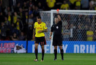 Soccer Football - Carabao Cup Second Round - Watford vs Bristol City - Watford, Britain - August 22, 2017 Watford's Jose Holebas is shown a red card by referee Tim Robinson Action Images via Reuters/Andrew Couldridge