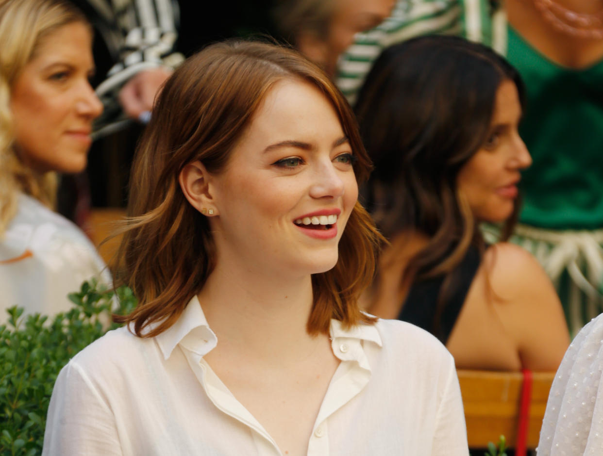 Emma Stone’s exposed bra look is making *business sexy* a thing