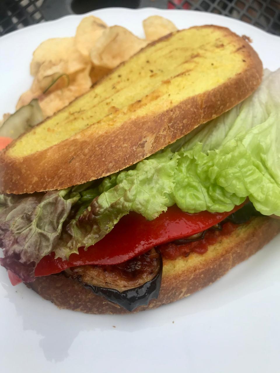 The Veggiewich from Ruta's in Crossroads Collective on the east side combines roasted red pepper and eggplant, lettuce and tomato chutney on the restaurant's own turmeric bread.