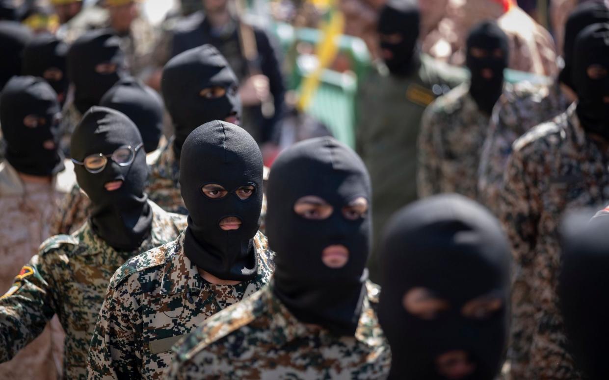 Members of the Islamic Revolutionary Guard Corps' (IRGC)