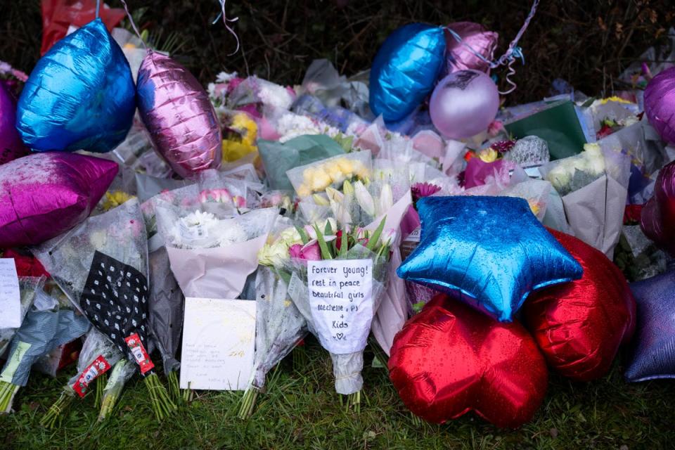 Floral tributes left near the scene of the accident near the A48 on 8 March 2023 in Cardiff, Wales (Getty)