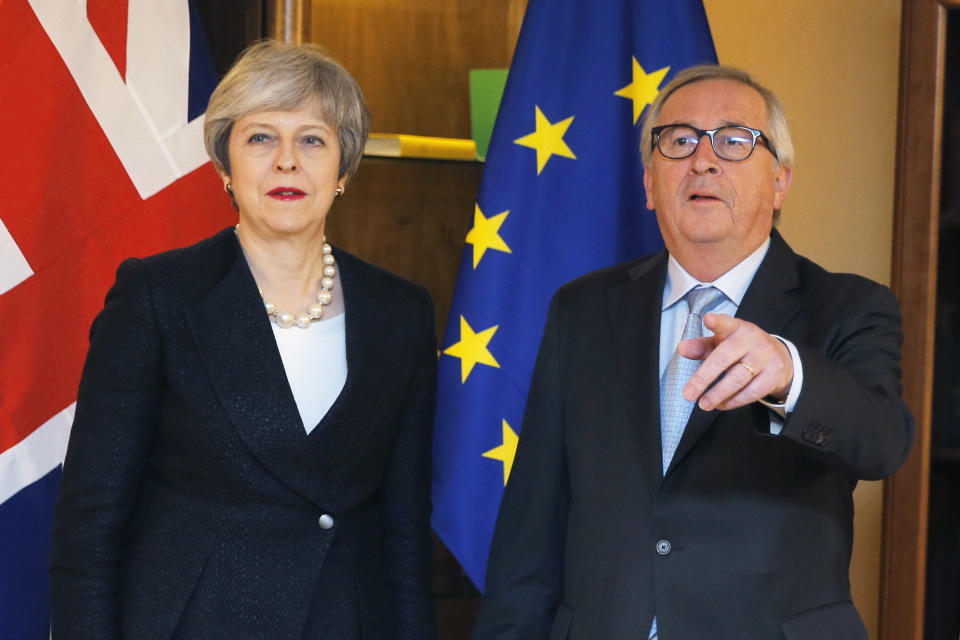 British Prime Minister Theresa May, left, poses for the media with European Commission President Jean-Claude Juncker in Strasbourg, France, Monday, March 11, 2019. May flew to Strasbourg, late Monday to try to secure a last-minute deal with the bloc. (Vincent Kessler/Pool Photo via AP)