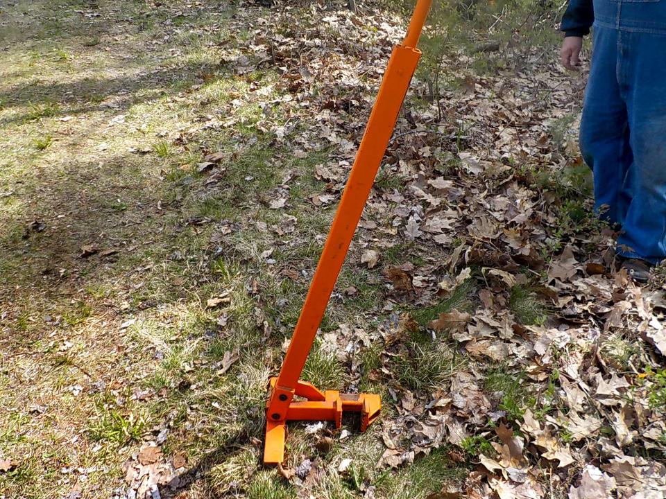 A weed wrench allows anyone to pull out invasive shrubs.