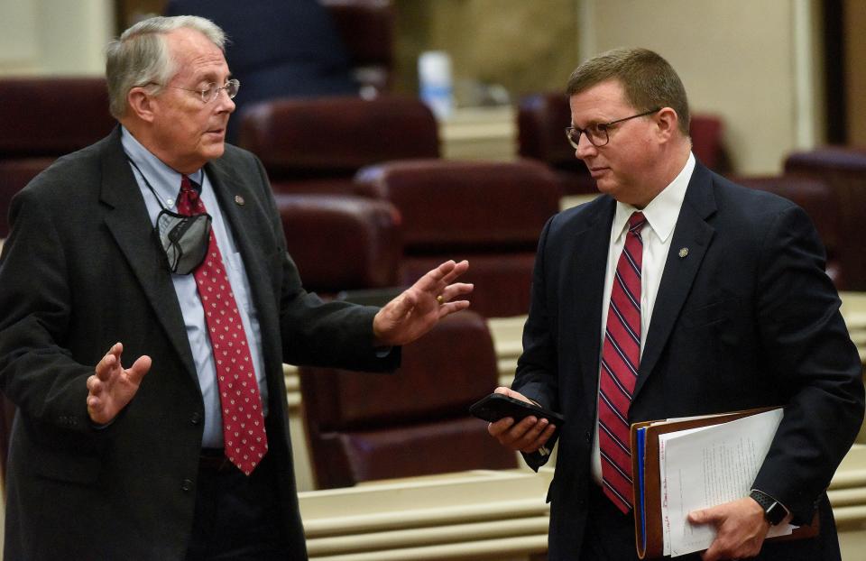 Rep. Arnold Mooney and Rep. Mike Jones talk during a recess in the special session at the Alabama Statehouse in Montgomery, Ala., on Thursday November 4, 2021. 