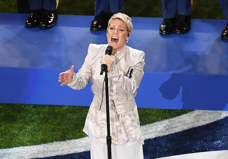 <p>What flu? The Grammy award winner battled through days of suffering from the virus to give a powerhouse performance of the national anthem before Super Bowl LII in Minneapolis. (Photo: Angela Weiss/AFP/Getty Images) </p>
