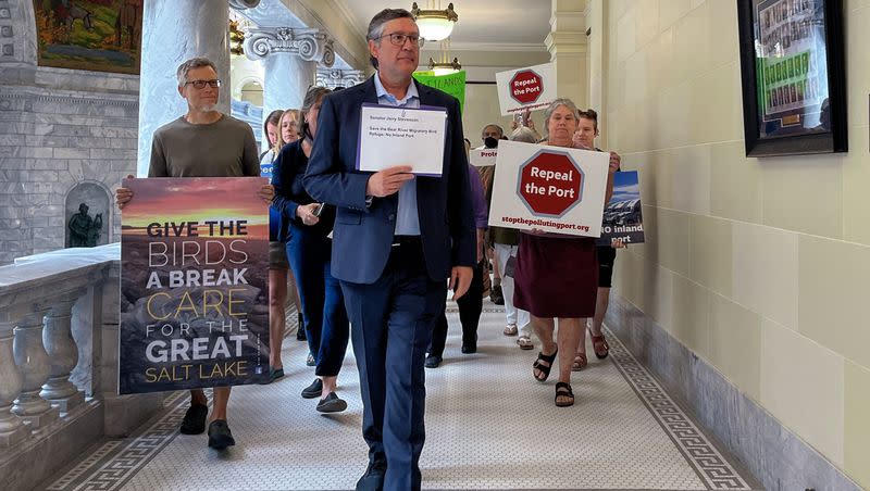 Jonny Vasic, executive director at Utah Physicians for a Health Environment, leads a group to deliver a petition opposing the Golden Spike Inland Port Project Area at the Capitol Thursday. 