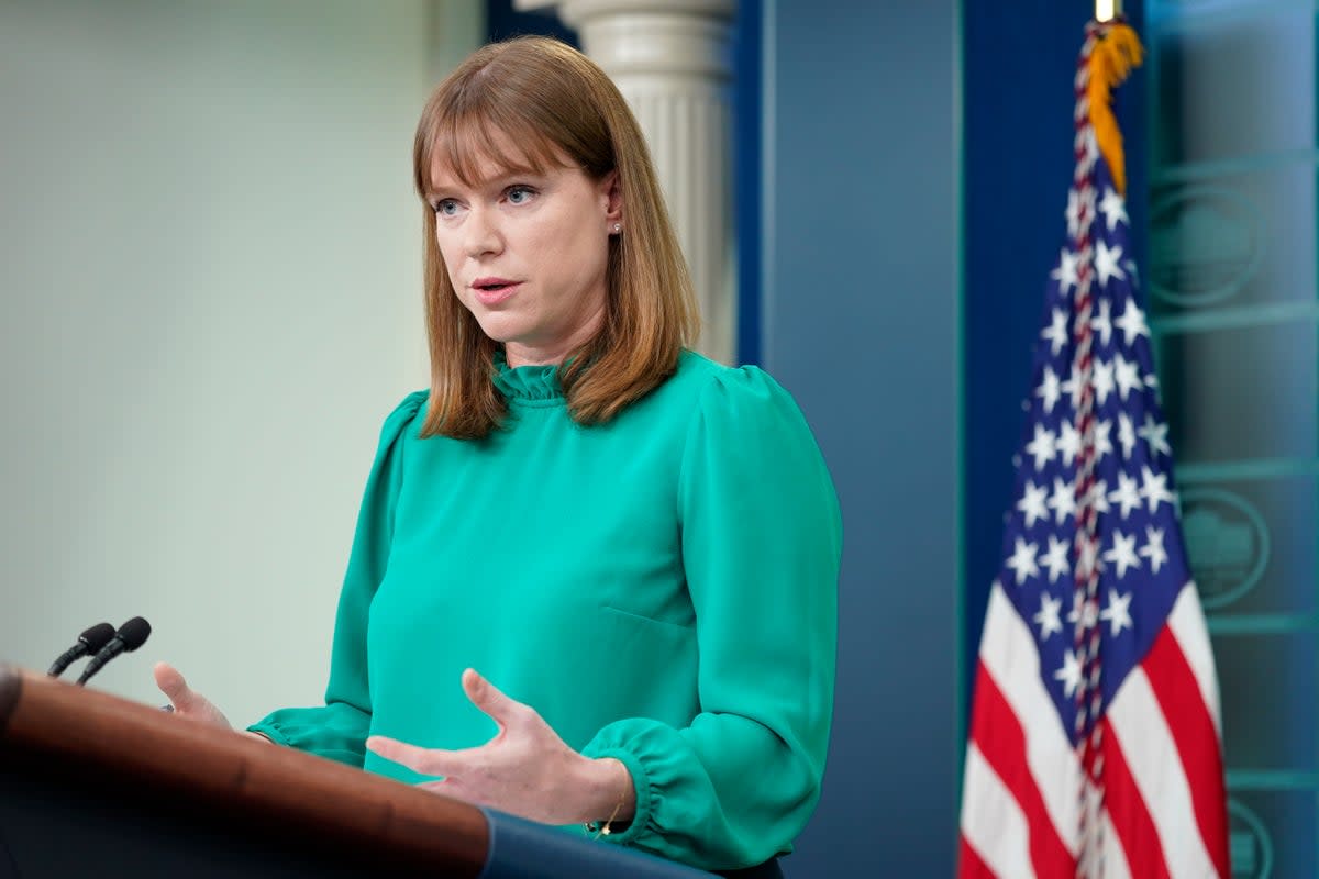 White House communications director Kate Bedingfield gave a sharp rebuke to former president Donald Trump for asking Vladimir Putin for a favour (AP)