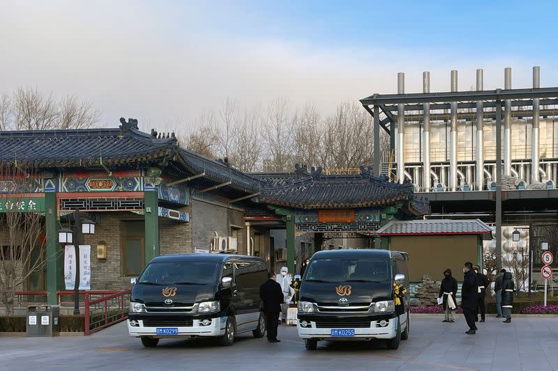 Workers at a funeral home in Beijing