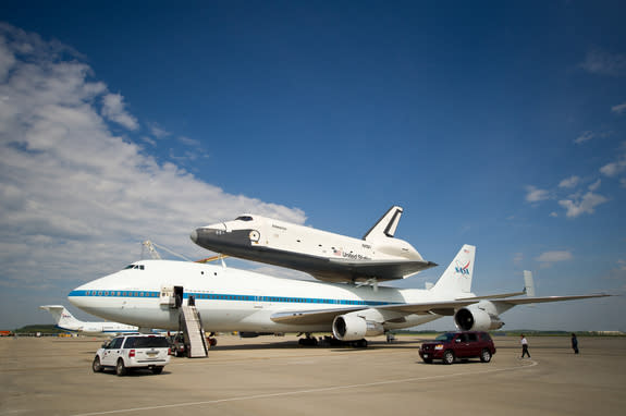 The space shuttle Enterprise is seen mated on top of the NASA’s Shuttle Carrier Aircraft (SCA), a modified Boeing 747 jumbo jet, at Washington Dulles International Airport on Saturday, April 21, 2012.