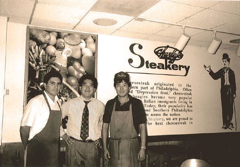 Charley Shin (center) opened Charley's Steakery in 1986 at North High Street and 17th Avenue. Charleys Cheesesteaks now has restaurants in 46 states and around the world.