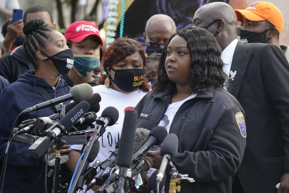 Bianca Austin speaks during a news conference, Friday, Sept. 25, 2020, in Louisville, Ky. Breonna Taylor's family attorney Ben Crump is calling for the Kentucky attorney general to release the transcripts from the grand jury that decided not to charge any of the officers involved in the Black woman's death. (AP Photo/Darron Cummings)