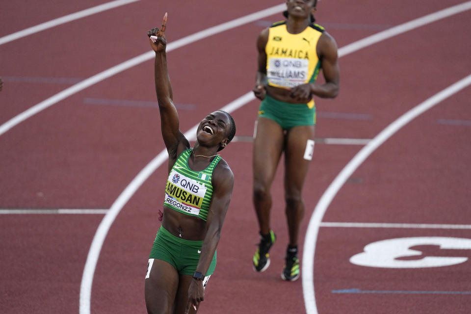 Tobi Amusan, of Nigeria, celebrates winning the women's 100-meter hurdles final at the World Athletics Championships on Sunday, July 24, 2022, in Eugene, Ore. (AP Photo/Gregory Bull)