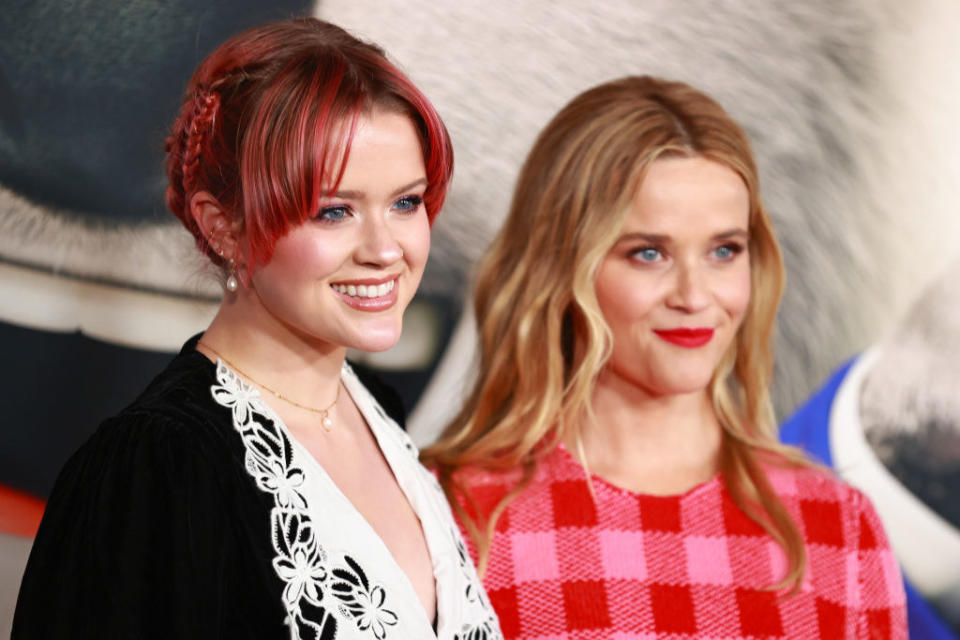 Ava and Reese pose together at a red carpet event