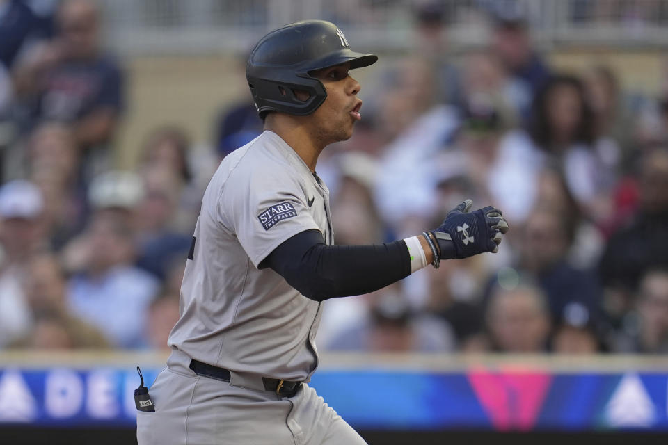 New York Yankees' Juan Soto reacts after striking out during the second inning of a baseball game against the Minnesota Twins, Tuesday, May 14, 2024, in Minneapolis. (AP Photo/Abbie Parr)