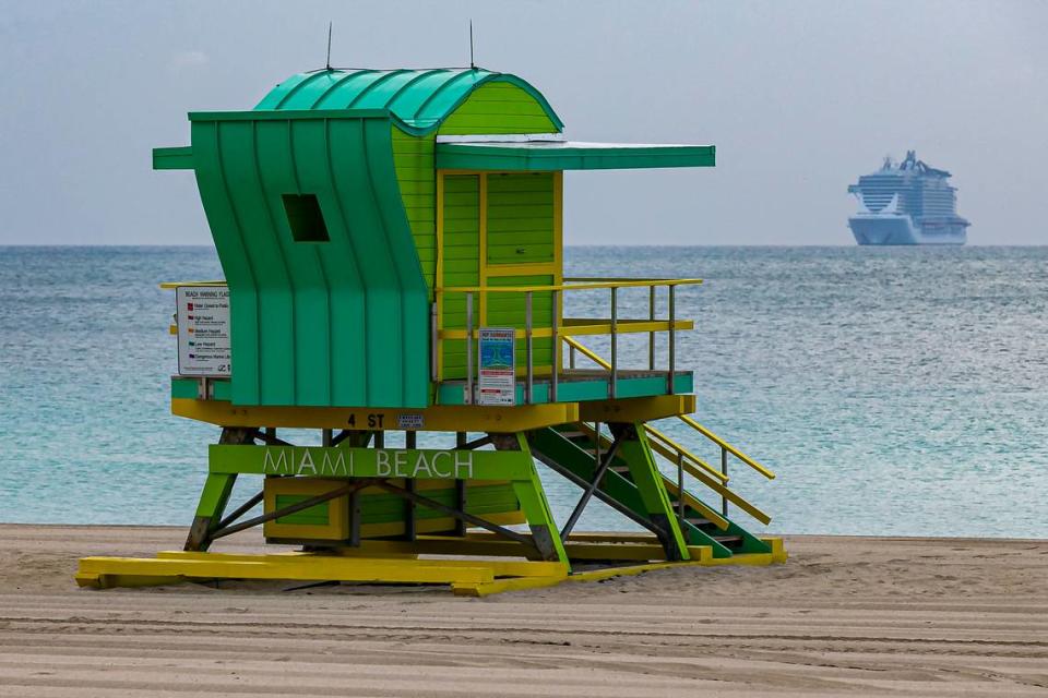 A cruise ship can be seen out in the water near Miami Beach on Wednesday, April 1, 2020.