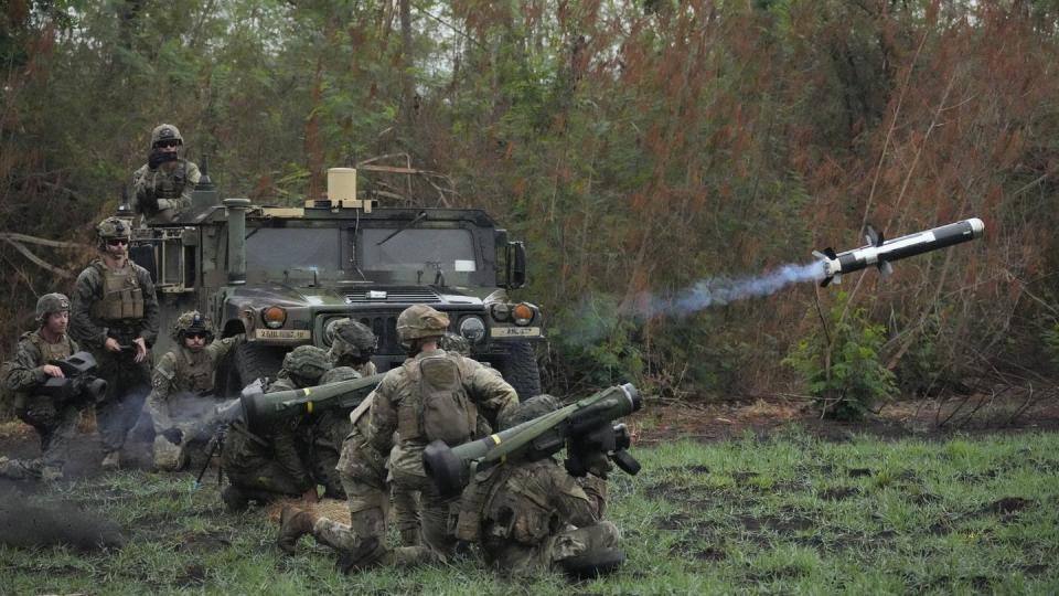 A Filipino soldier launches a Javelin anti-tank missile at Fort Magsaysay in Nueva Ecija province, northern Philippines, on April 13, 2023. (Aaron Favila/AP)