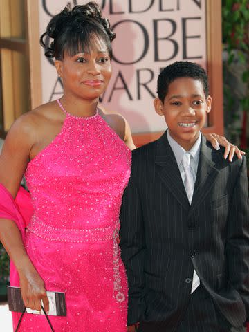 <p>Chris Haston/NBCU Photo Bank/NBCUniversal/Getty</p> Angela Williams and Tyler James Williams arrives at The 63rd Annual Golden Globe Awards.