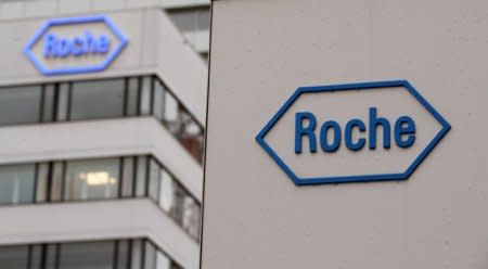 FILE PHOTO: The logo of Swiss drugmaker Roche is seen at its headquarters in Basel, Switzerland February 1, 2018. REUTERS/Arnd Wiegmann/File Photo