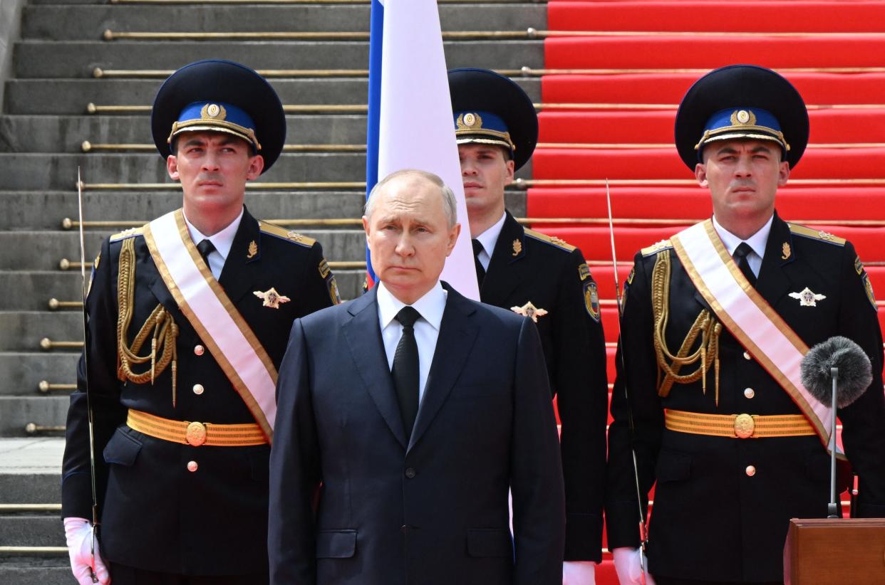 Russian president Vladimir Putin holds a minute of silence for pilots killed in clashes with the mutineers during a revolt by Wagner mercenaries (AFP via getty images)