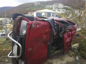 <p>A damaged vehicle is flipped on its side in the aftermath of Hurricane Irma in Tortola, in the British Virgin Islands, on Sept. 7, 2017. (Photo: Jalon Manson Shortte via AP) </p>