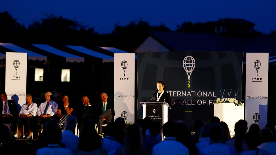 Li Na gives her speech after being inducted into the International Tennis Hall of Fame in Newport, Rhode Island on July 20, 2019. | Omar Rawlings— International Tennis Hall of Fame/Getty Images