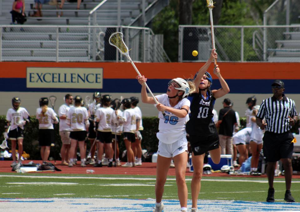 The ball drops between Ponte Vedra's Aubrey Schmidt (16) and Bartram Trail's Ryann Frechette (10) during the 2023 Rivalry on the River.