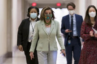 Speaker of the House Nancy Pelosi, D-Calif., leaves a news conference day after advancing sweeping voting and ethics legislation, and passing the George Floyd Justice in Policing Act, at the Capitol in Washington, Thursday, March 4, 2021. (AP Photo/J. Scott Applewhite)