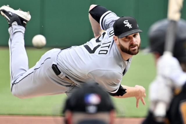 Chicago White Sox starting pitcher Lucas Giolito (27) departs the