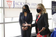 First lady Jill Biden, right, and Jackson-Hinds Comprehensive Health Center CEO Jasmin Chapman speak to recently vaccinated patients during a visit to a COVID-19 vaccination site at Jackson State University in Jackson, Miss., Tuesday, June 22, 2021, as part of Biden administration's nationwide tour to reach Americans who haven't been vaccinated and to promote vaccine education. (AP Photo/Rogelio V. Solis)