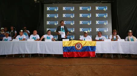 Revolutionary Armed Forces of Colombia (FARC) commander Ivan Marquez and members of the leadership attend a news conference at the camp where they prepare to ratify a peace deal with the Colombian government, near El Diamante in Yari Plains, Colombia, September 23, 2016. REUTERS/John Vizcaino