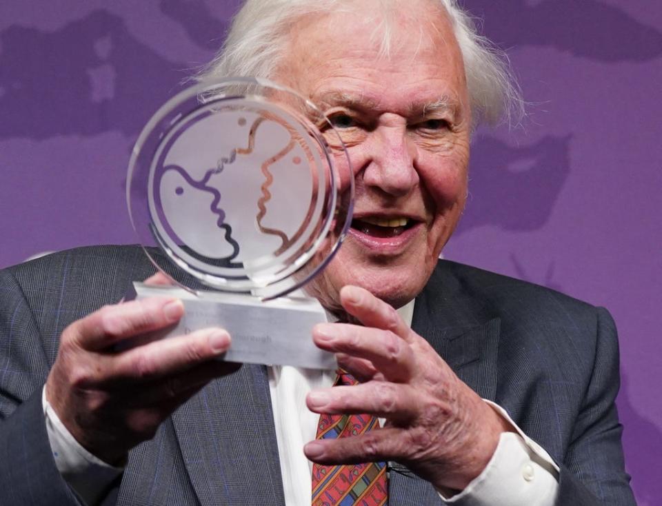 Sir David Attenborough is presented with a Chatham House Centenary Lifetime Award during an event to celebrate his work and achievements at Chatham House in London (Yui Mok/PA) (PA Wire)