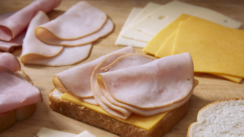 Deli meat, bread, and cheese