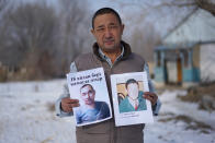 In this Dec. 8, 2018, photo, Adilgazy Yergazy, a farmer, holds up pictures of his detained younger brothers at his home in a village near Almaty, Kazakhstan. The Kazakhstan Foreign Ministry says China is allowing more than 2,000 ethnic Kazakhs to abandon their Chinese citizenship and leave the country, a sign that Beijing may be starting to feel a mounting backlash against a sweeping crackdown on Muslims in its far west region of Xinjiang. Yergazy says two of his little brothers were arrested and taken to internment camps last year, and that one was recently released from the camps but is unable to leave China. (AP Photo/Dake Kang)