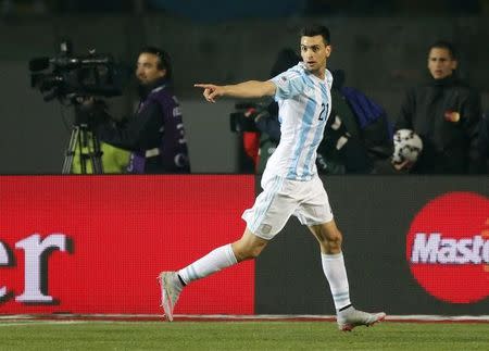 Argentina's Javier Pastore celebrates after scoring against Paraguay during their Copa America 2015 semi-final soccer match at Estadio Municipal Alcaldesa Ester Roa Rebolledo in Concepcion, Chile, June 30, 2015. REUTERS/Andres Stapff