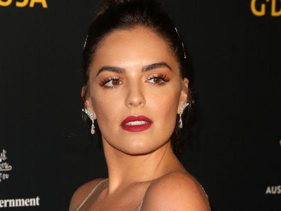 ‘Neighbours’ star Olympia Valance called the cyber crime a ‘profound violation’ (Rex Features)