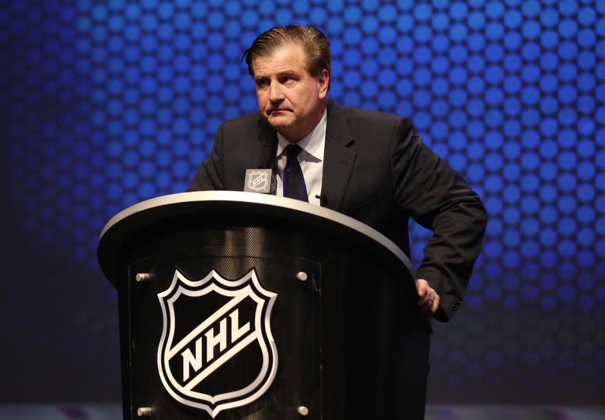 The Vancouver Canucks have reportedly extended general manager Jim Benning's contract. (Bill Streicher-USA TODAY Sports)