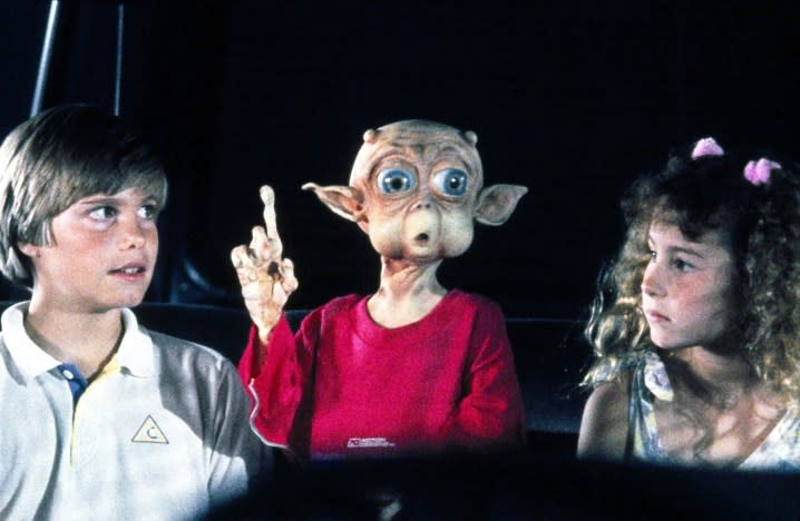 Two kids look at an alien in Mac and Me.
