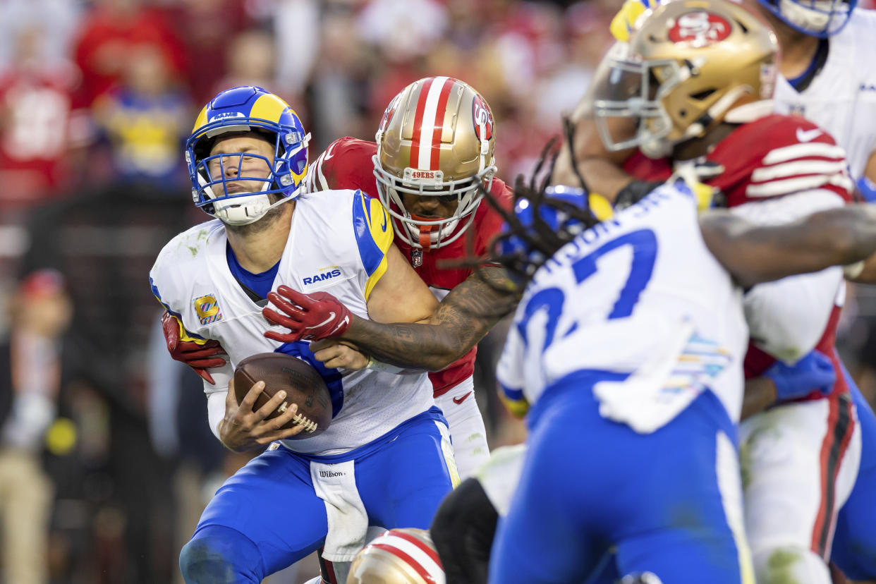 49ers coernerback Deommodore Lenoir sacks quarterback Matthew Stafford during San Francisco's win. (AP Photo/Jeff Lewis)