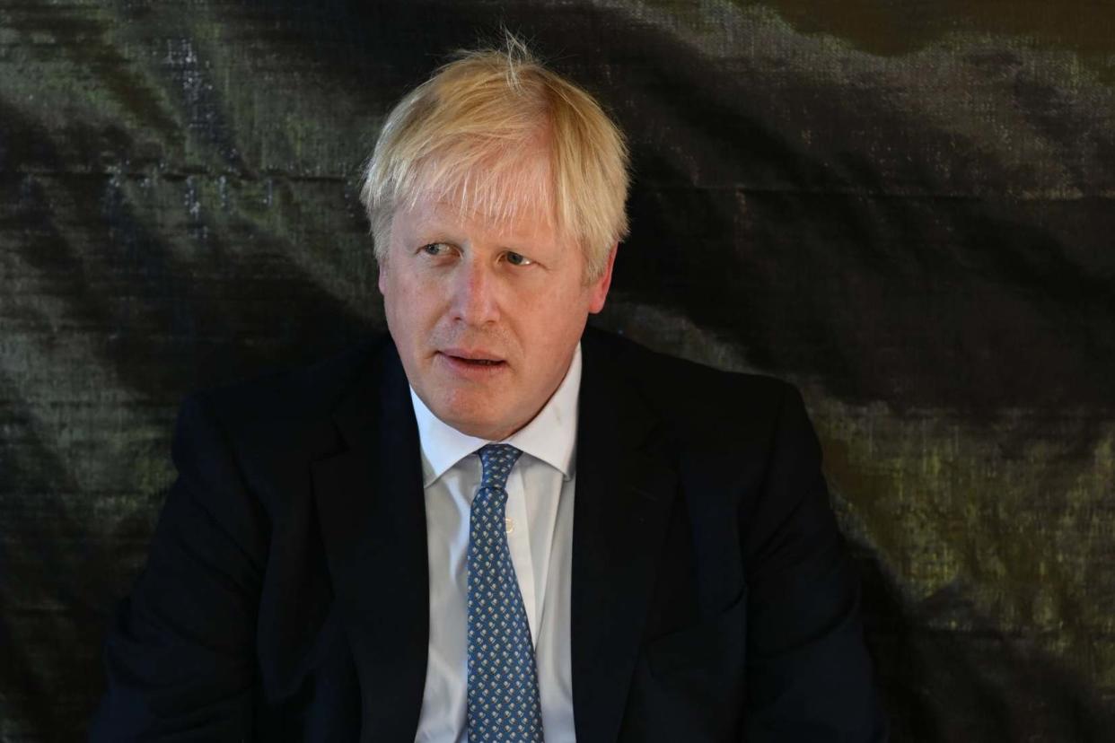 As the Supreme Court hearing drew to a close on Thursday, Boris Johnson met military personnel near Salisbury: Ben Stansall/PA